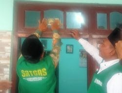 Satgas GKMNU Kabupaten Mojokerto Sebar Ribuan Spanduk dan Stiker di Rumah Warga